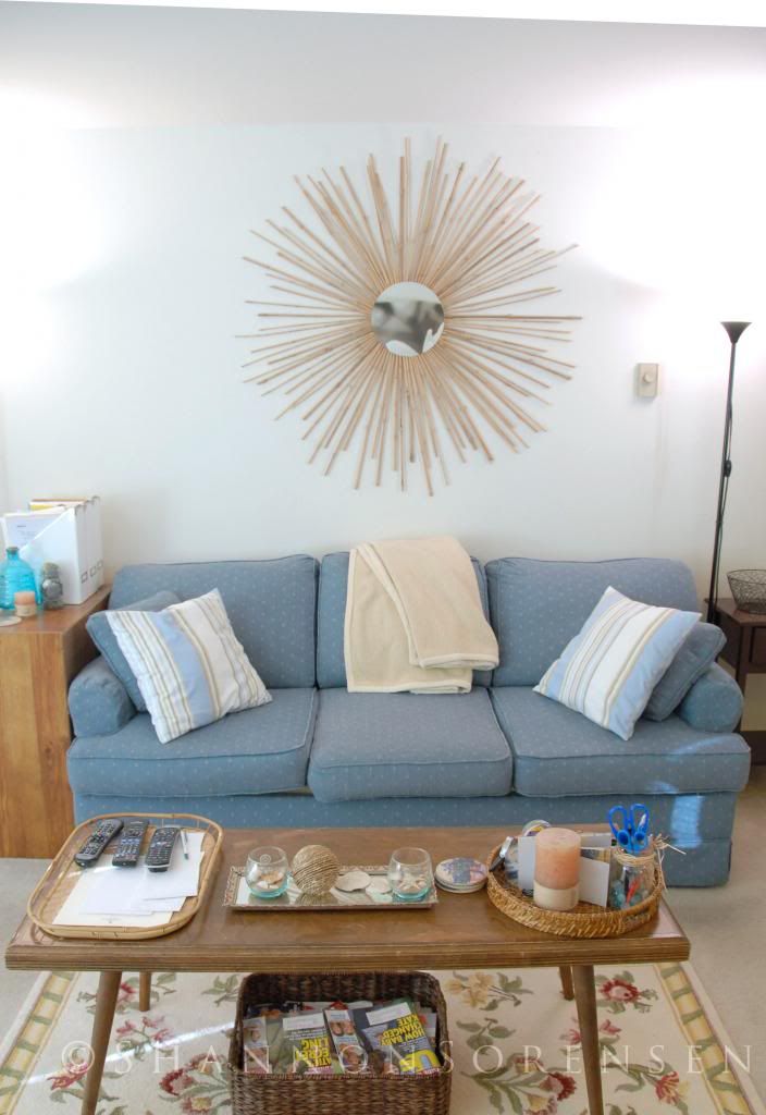 redecorating on a budget with a cream light colored couch